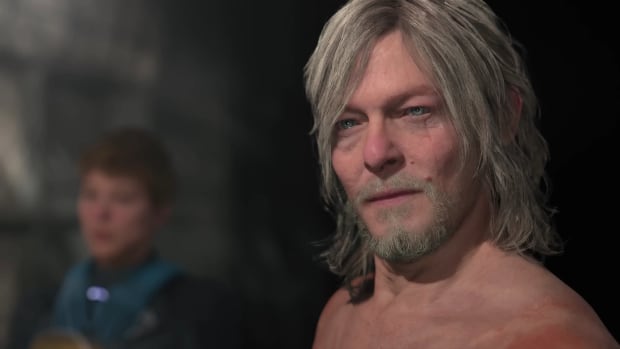 A teary-eyed and topless Norman Reedus sports gray hair in the Death Stranding 2 trailer.