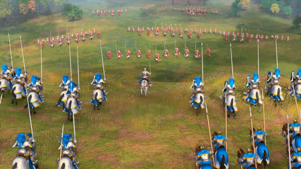 Two armies of knights clash in Age of Empires 4.