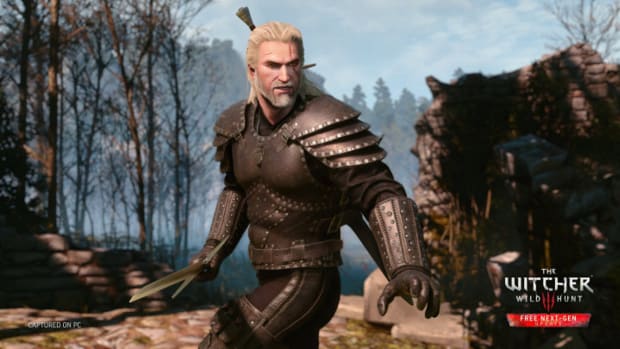 This fan is already making The Witcher 3’s next-gen update even better: A white man with long white hair, wearing black plate armor, stands with a crossbow in his right hand as if anticipating an attack. Scorched woodlands and ruined buildings are behind him