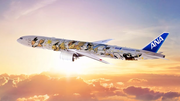 A Boeing jet from ANA adorned with Eevee from Pokemon with its evolutions