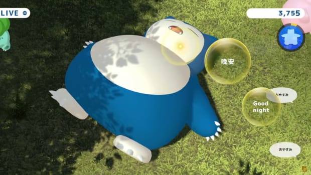 Pokémon Go Snorlax sleeping on a bed of grass.