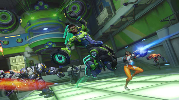 A black man wearing a high-tech green suit is leaping through the air with his left arm raised, while an old man with a hammer and a woman wearing an orange jumpsuit run behind him.