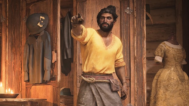 A Skull and Bones character wearing a bright yellow shirt stands in the middle of a clothing store. He's pointing straight ahead with his right index finger