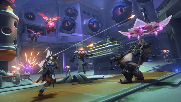 A squad of Overwatch 2 heroes is fighting alien monsters in an underground science facility