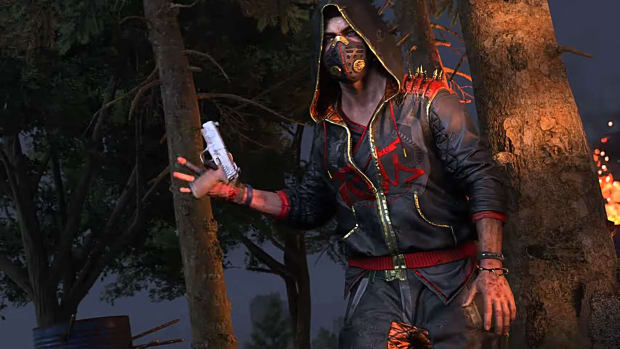 A Dying Light 2 character, dressed in a black and red hoodie with gold trim and matching pants, spinning a pistol in his right hand.