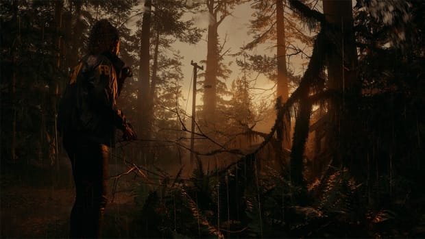 Saga Anderson wearing an FBI jacket standing in a forest at dawn.