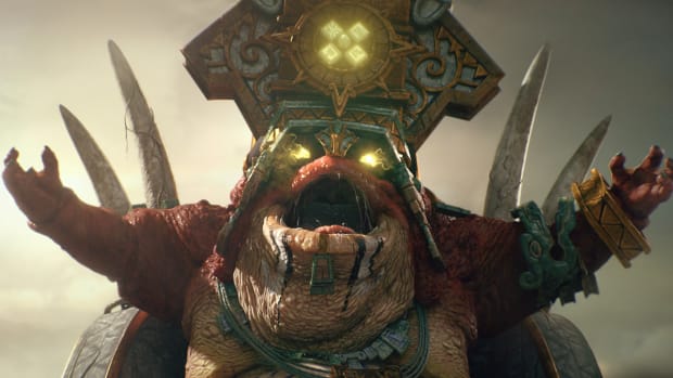 A toad-like Slann from a Total War: Warhammer trailer.