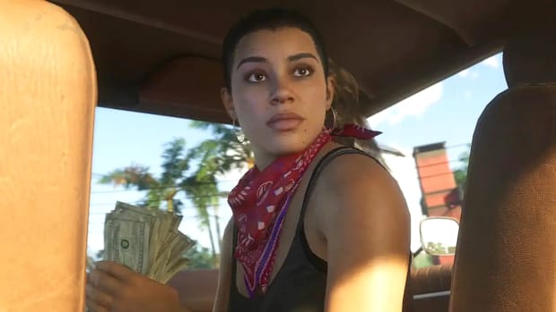 A Latina woman with her hair in a ponytail, wearing a red bandana and a green tanktop, is sitting in a car, looking over her shoulder with a wad of cash in her hand