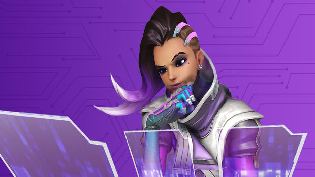 Overwatch 2's Sombra sits at a virtual desk, monitoring three virtual computer screens with her chin resting on the back of her left hand