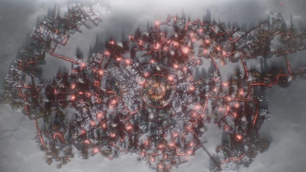 Frostpunk 2 screenshot of a city enclosed in ice.