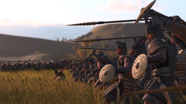 Total War: Pharaoh screenshot of troops wielding harpoons.