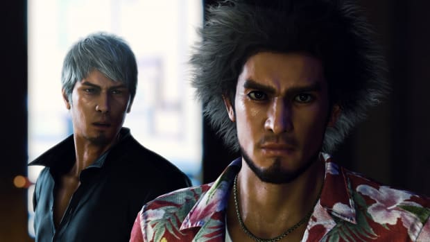 Like A Dragon Infinite Wealth's Ichiban and Kiryu stand in shadow with a blurry suggestion of the city outside behind them