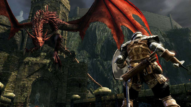 A warrior faces off against a dragon in Dark Souls.