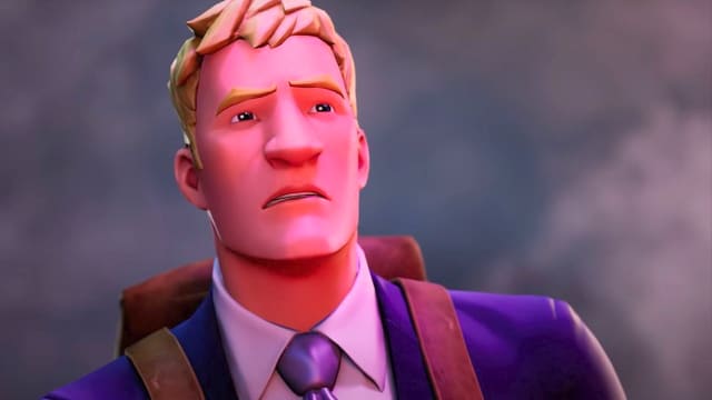 Fortnite's Jonesy, wearing a suit jacket and backpack, squints in confusion as a bright purple light shines into his face