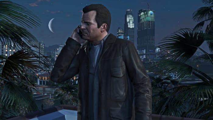 GTA 5 screenshot of a character on the phone.