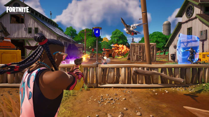 Fortnite fighting alongside the Falcon Scout to capture a point