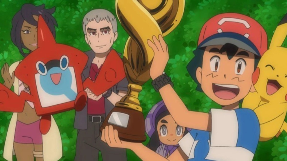 Pokemon anime Ash holding the Alola League trophy aloft