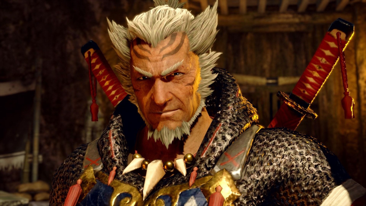 Monster Hunter Rise weapons explained: Which weapon is right for you - An anime man with a worn face and pointy gray hair is wearing chain mail, a gold necklace, and a second necklace made of large teeth. On his back are two long swords with red leather handles. His expression is grim, but determined