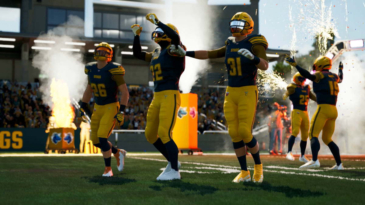 American football players cheer after a win.
