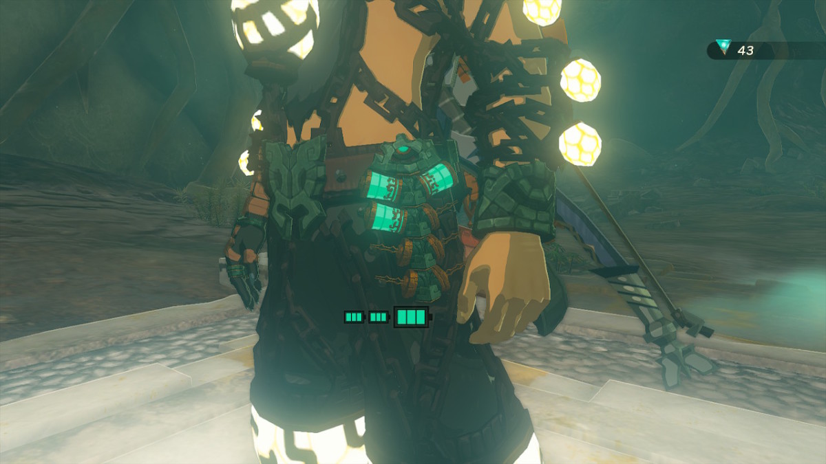 A screenshot from Tears of the Kingdom showing small capsules filled with light hanging from a belt on Link's waist.