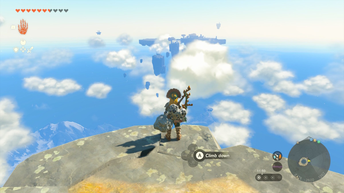 A Tears of the Kingdom screenshot showing Link standing on an island in the sky overlooking Hyrule. In the distance, more sky islands can be seen.