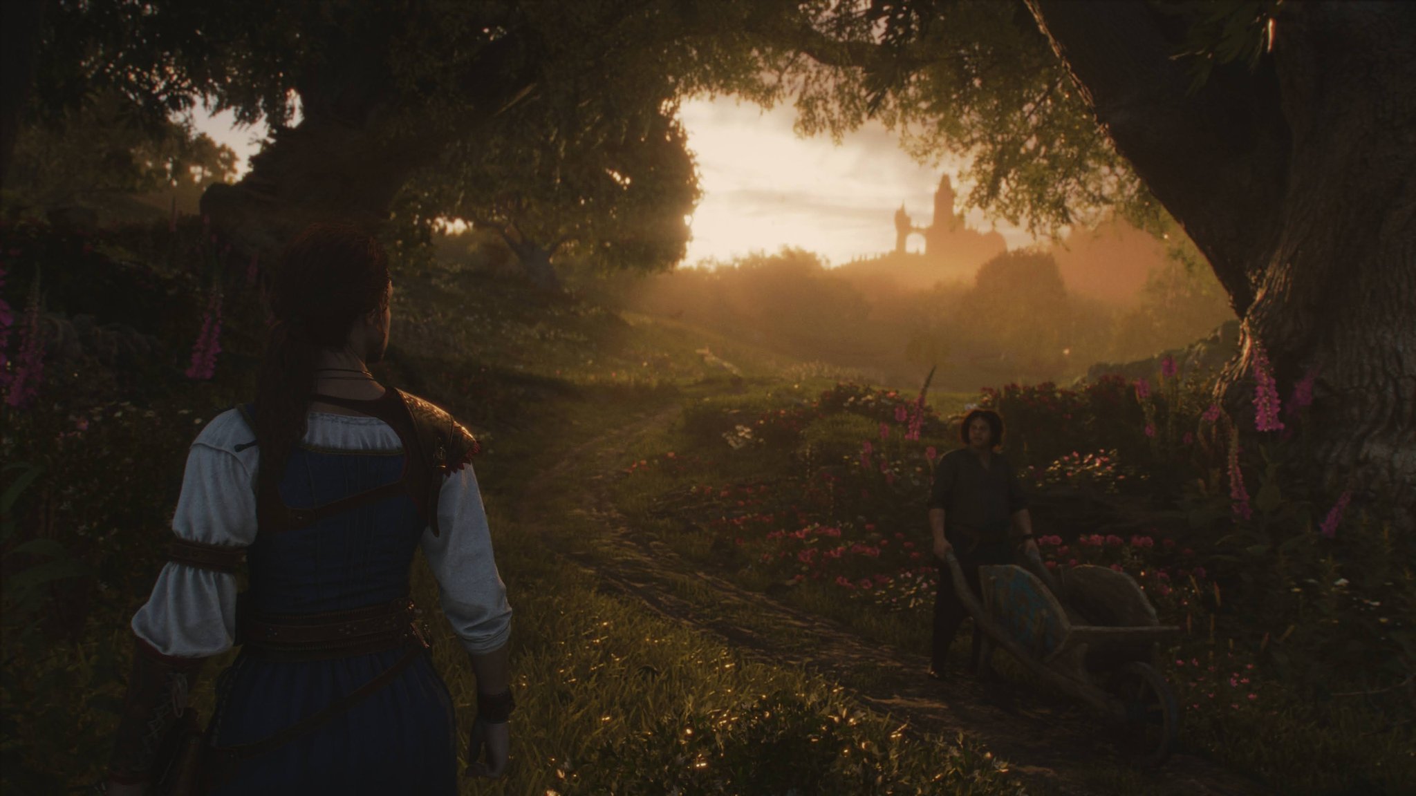 The main character stands in the woods as a man walks past with a wheelbarrow in Fable. A fairytale castle is in the distance and the sun peeks through the canopy.
