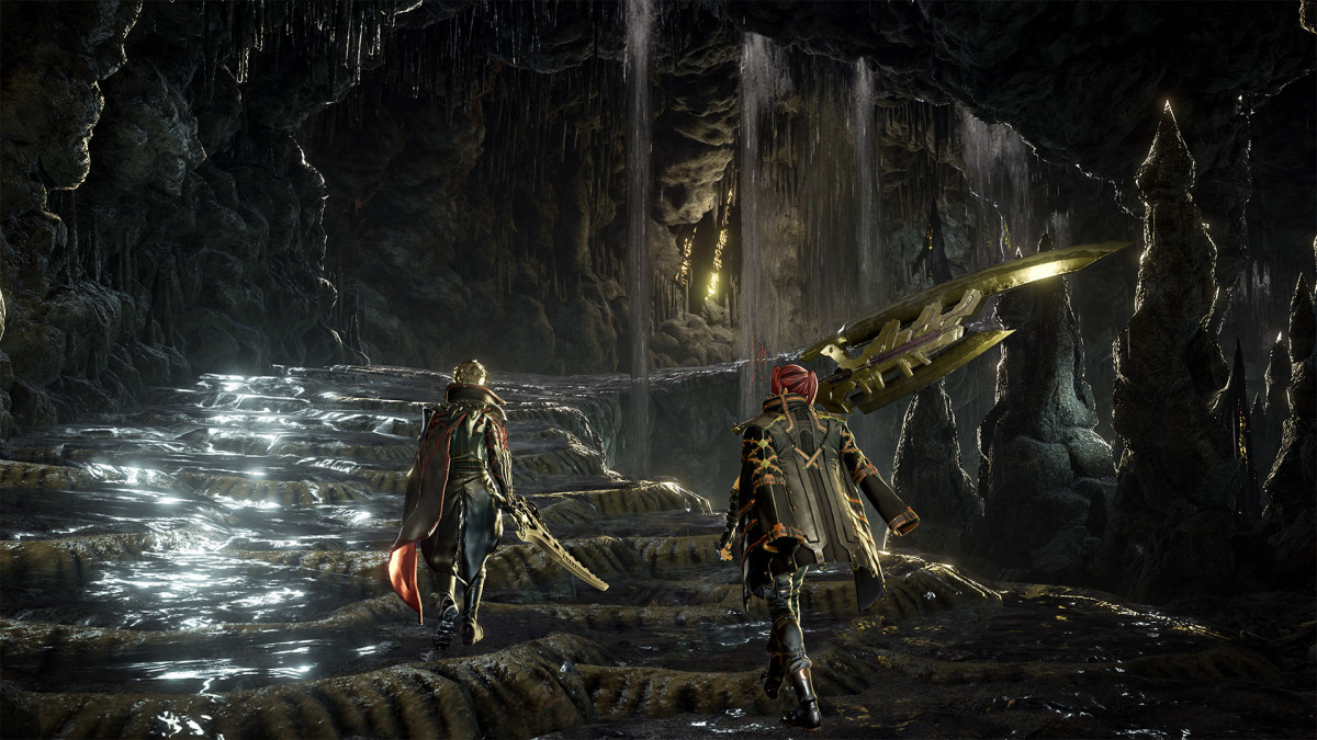 Code Vein screenshot of two characters walking in a cave.