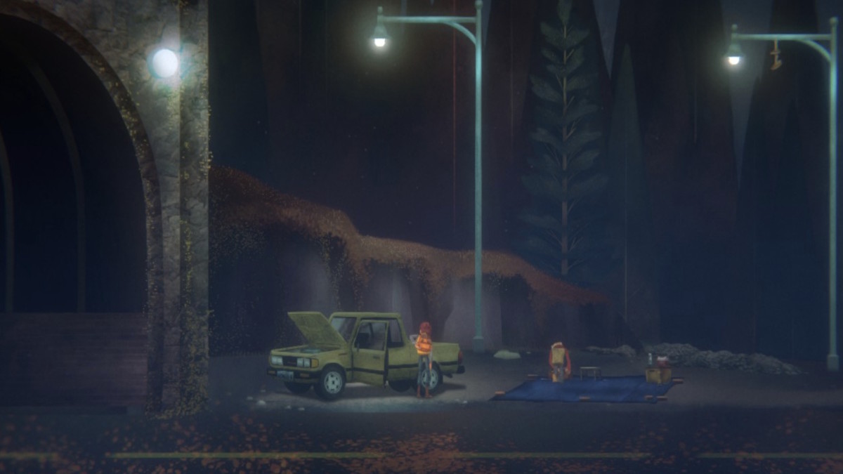 A man stands beside a green truck with its hood open in the middle of a lonely rode that runs through a dark forest.
