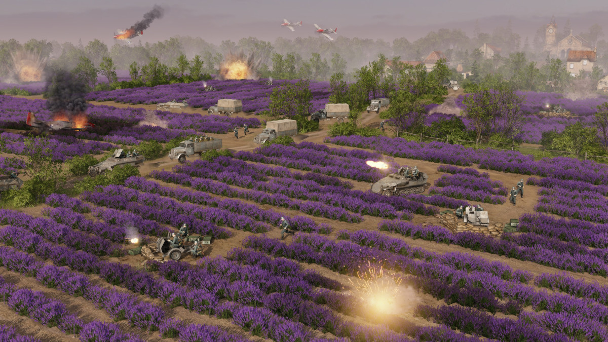 Men of War 2 screenshot of vehicles and artillery firing inside a tulip field.