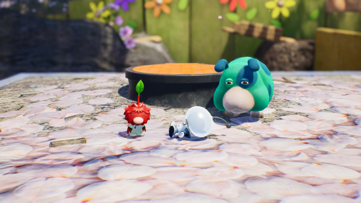 A green dog is standing next to a small human with a clouded space helmet, and on the left is a small humanoid figure with red leaves for a face