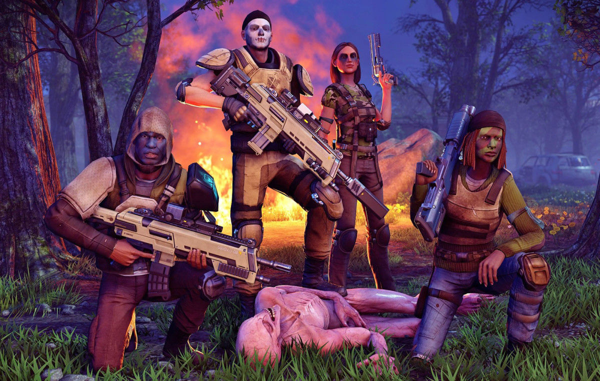 XCOM 2 squad posing over an alien corpse