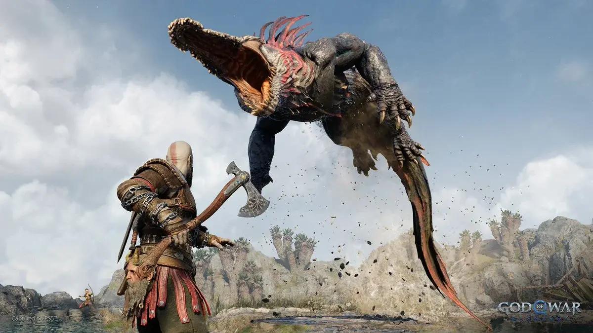 A giant crocodile leaps at Kratos in God of War Ragnarok.