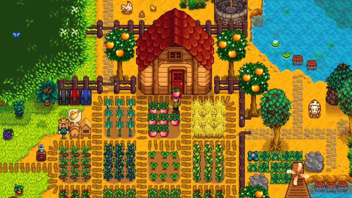 The player builds a large farm in Stardew Valley.