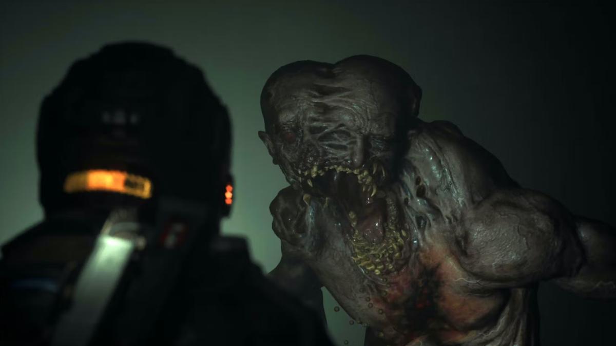 A creature with a gaping jaw and two conjoined heads walks close to the player in The Callisto Protocol.