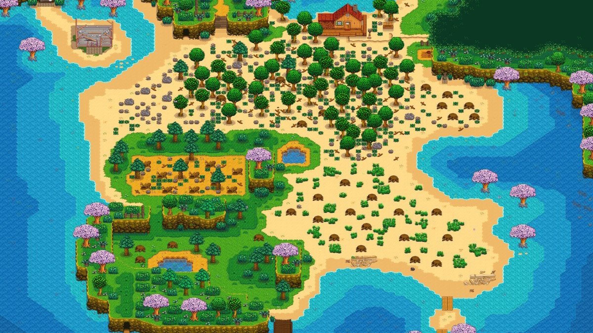 Stardew Valley's Beach Farm, with sandy fields in the center and a small grassy patch in the south
