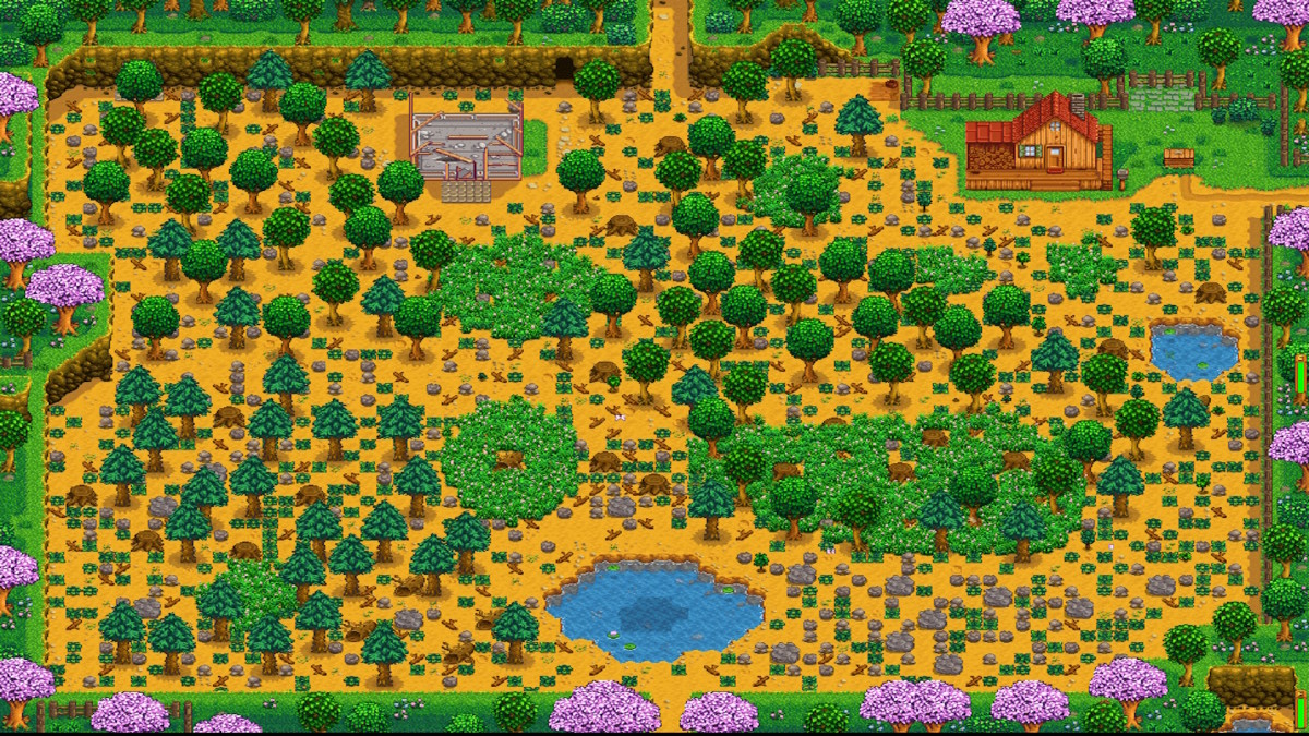 Stardew valley's Standard Farm, a large, open field with rocks, grass, and trees