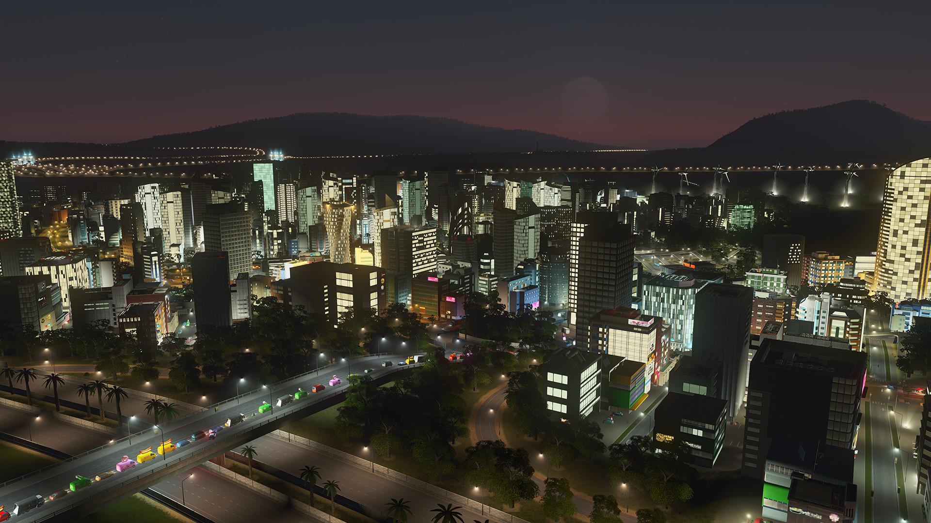 Cities Skylines screenshot of a city at night.