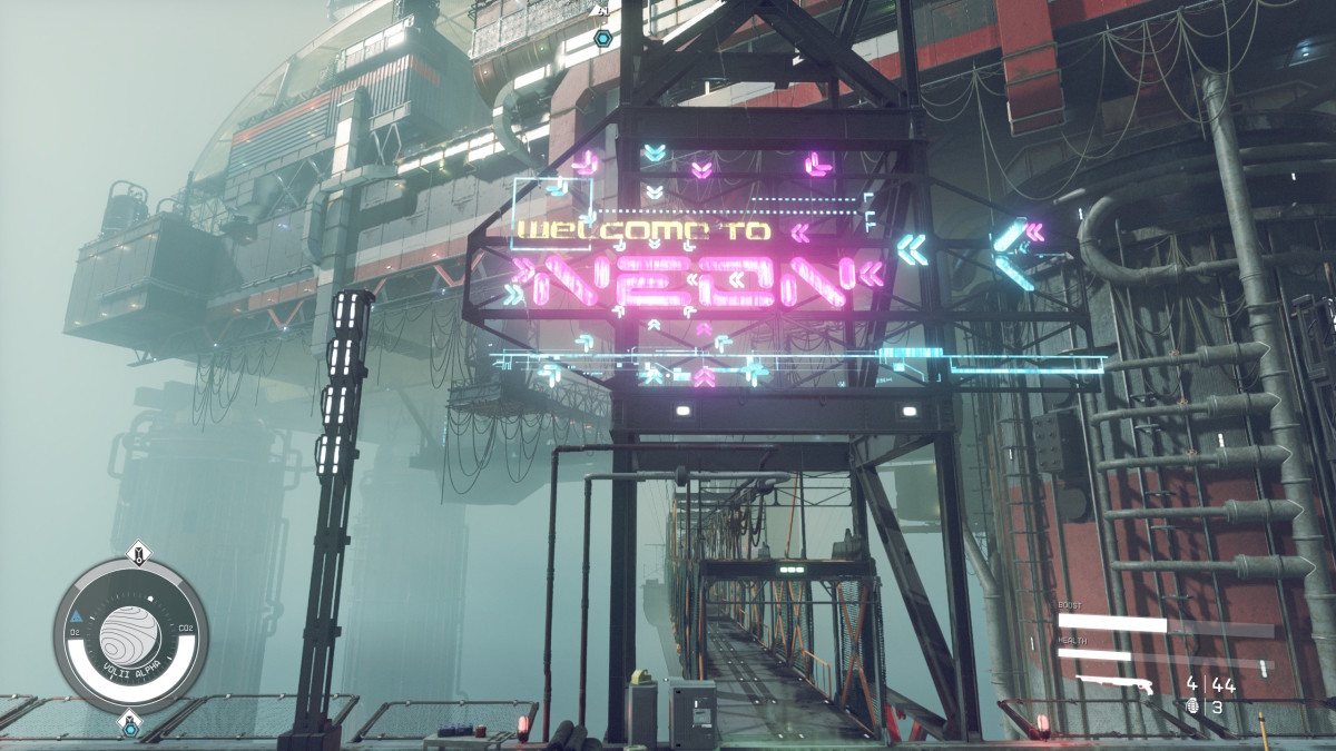 A brightly lit sign spells out "Welcome to" in yellow neon lights and "NEON" in garish pink.