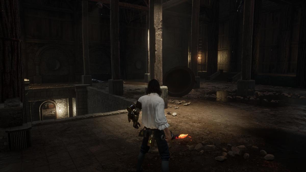 The player is shown near steps that lead to a room.
