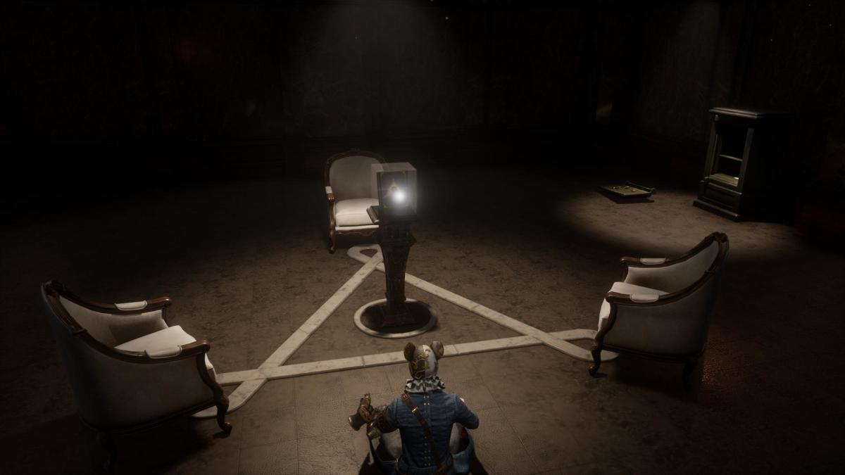  A player is in a dimly lit room with a triangular symbol on the floor.