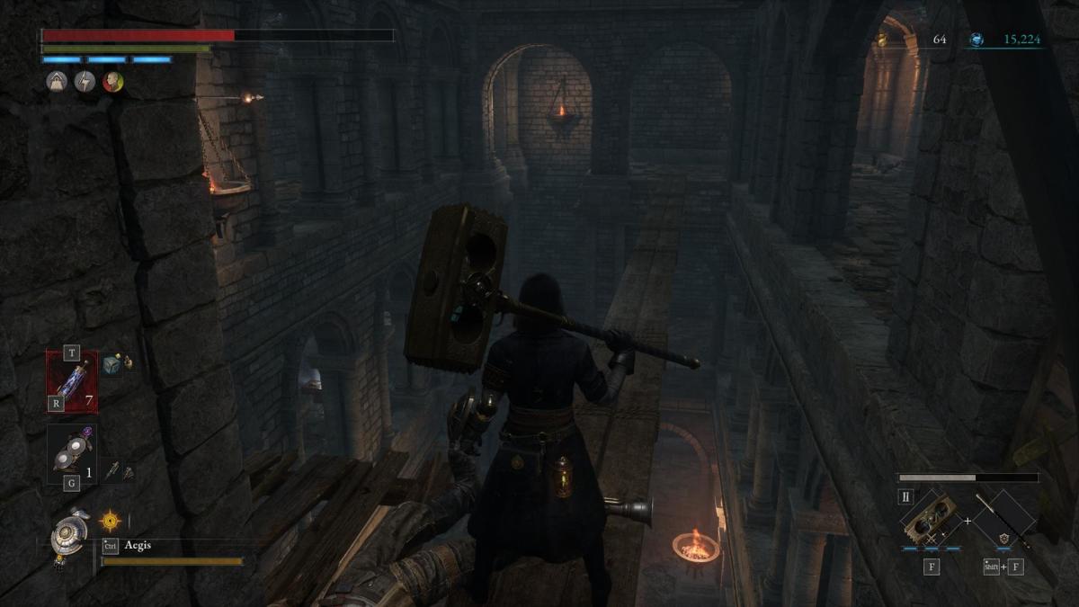 A player is standing on a wooden beam. A chest on a lower ledge is also visible.