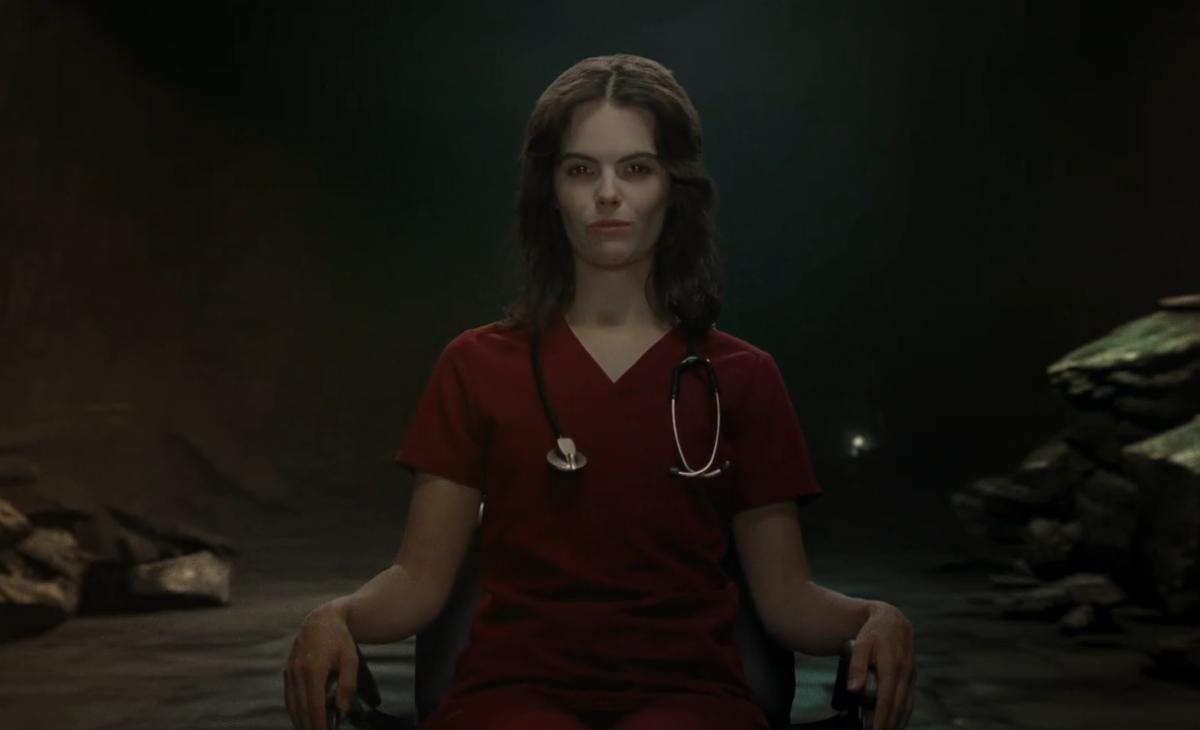Diablo 4 Blood Harvest promo trailer screenshot of a vampiric looking doctor sitting on a chair.