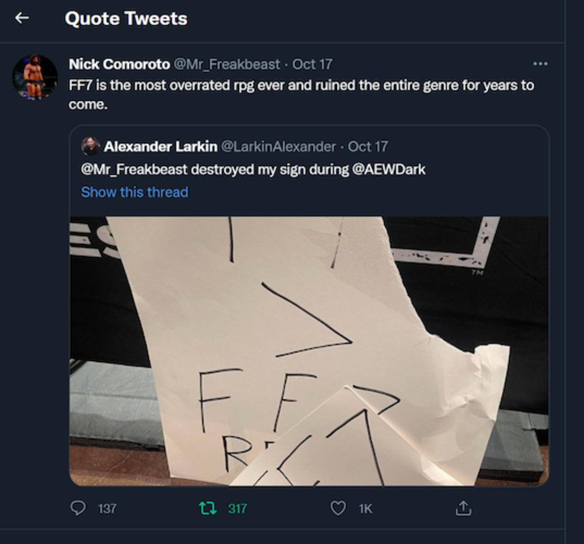 Torn AEW fan sign that says "FF7 > FF7 Remake"