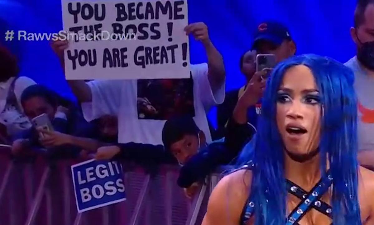 WWE fan sign that says "You became the boss! You are great!" behind Sasha Banks