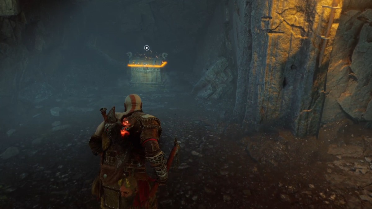 A reward chest hidden in the shadows at a sanctuary in God of War Ragnarok Valhalla DLC