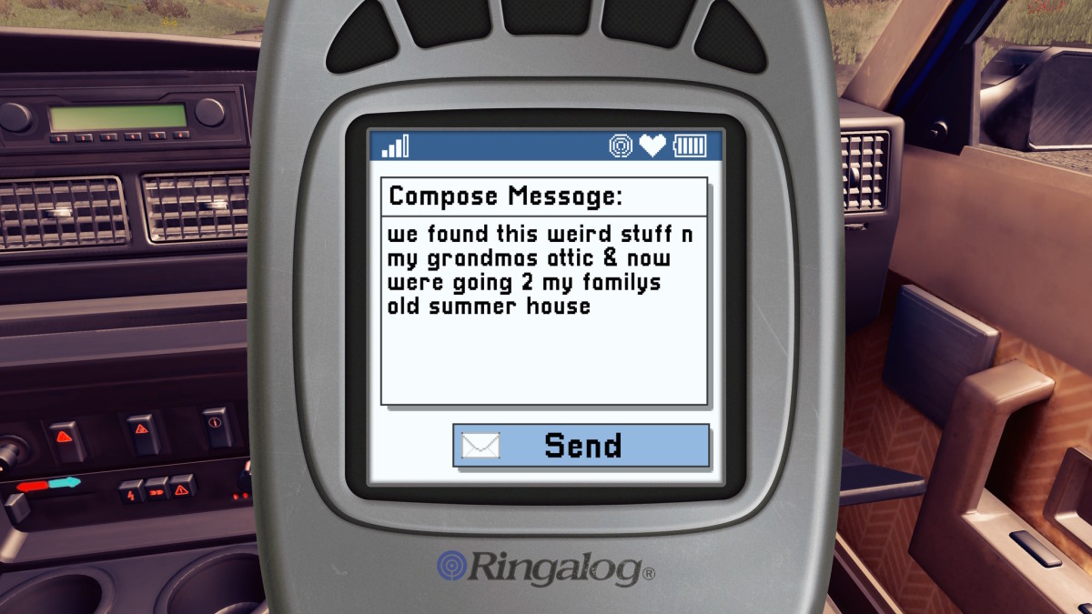 An old 2000s cellphone displays a text message against a white screen