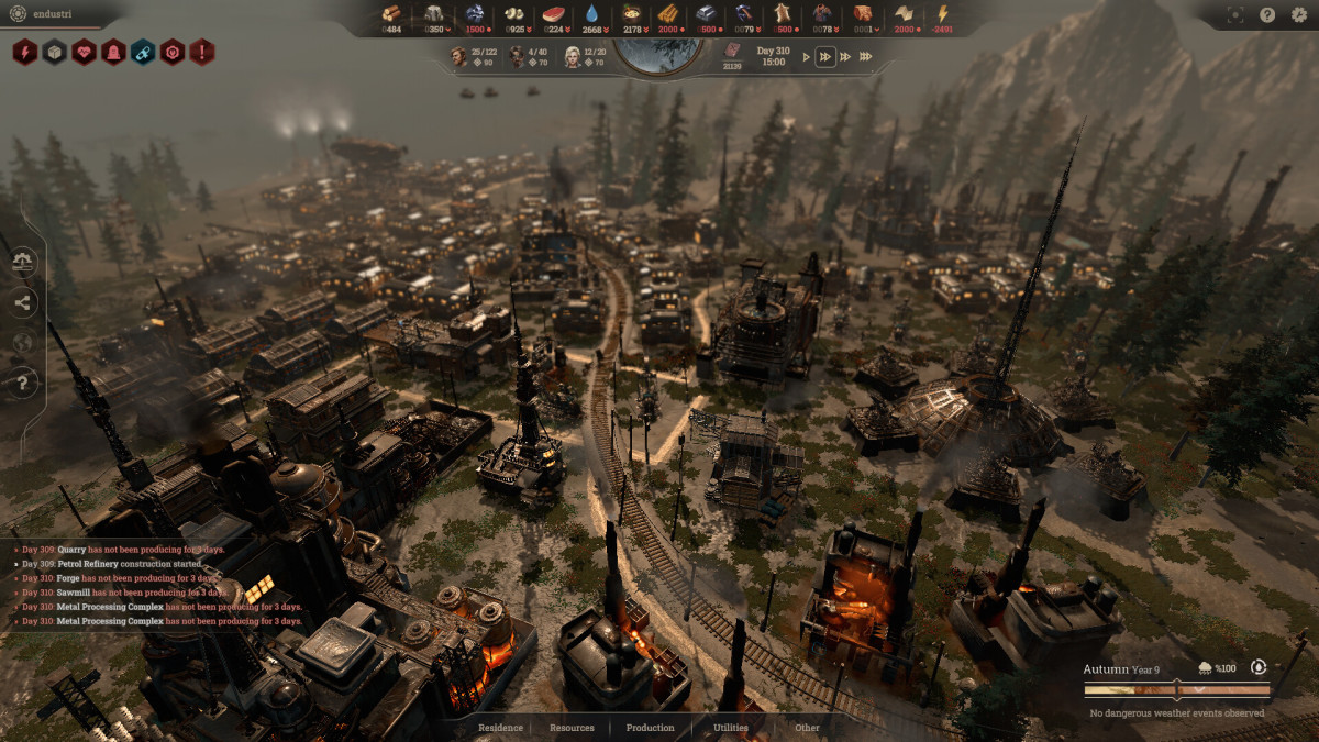 New Cycle screenshot showing an industrialized town with a railway going through it.